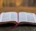 Christian reading the Bible and praying while seeking to live a faith-filled life through biblical principles, spiritual growth, and daily devotion